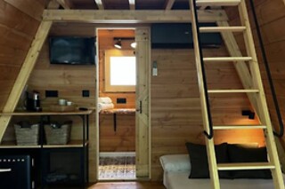 Una noche con desayuno en la cabaña para 2 adultos y 1 niño en Camping Alguer - Tienda Glamping Nima en  Les Planes D´Hostoles (Girona)