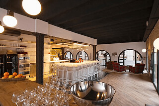 Curso de cocina de alta gama de paella y tapas en un loft
